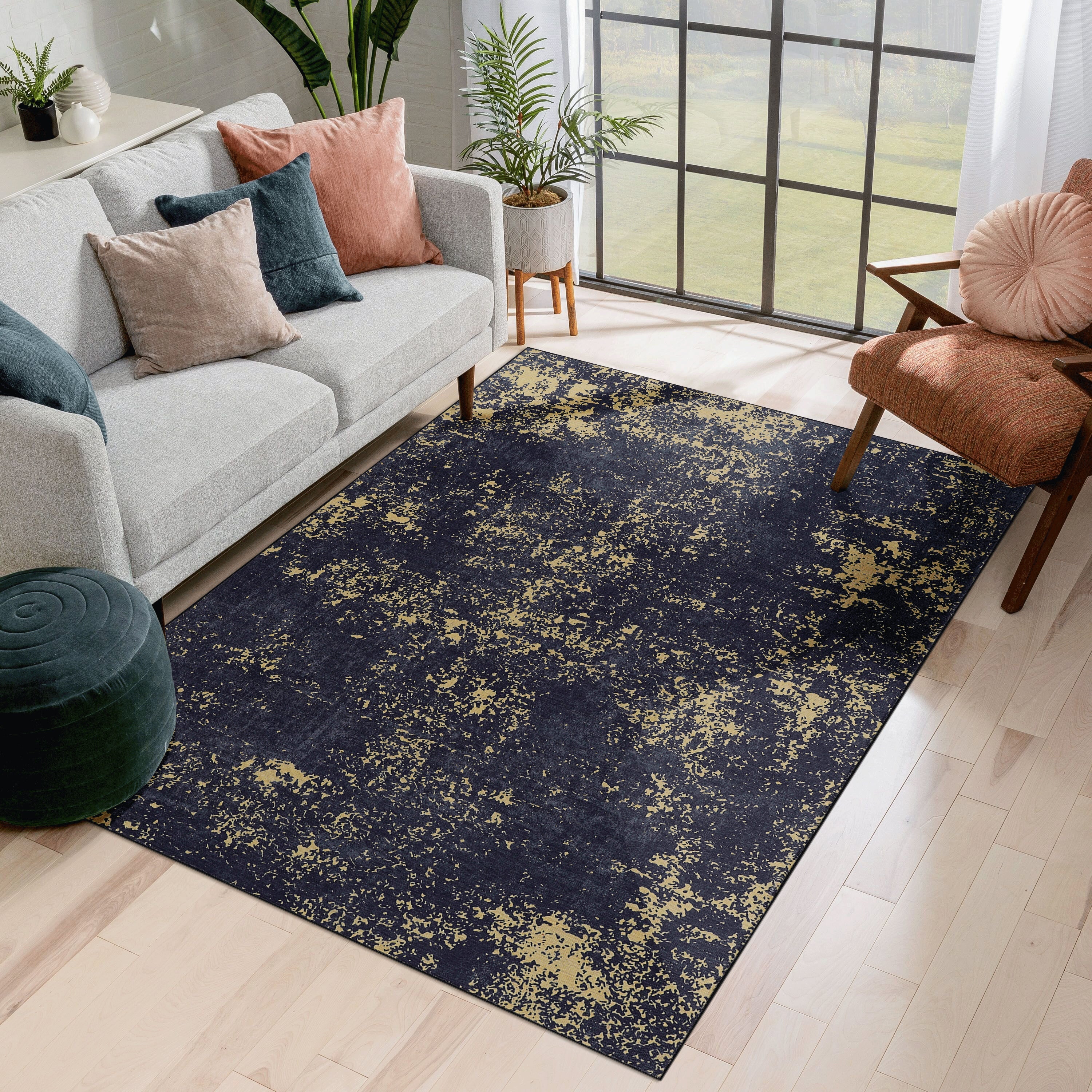 Washable area rug 6 x 9 ft in Black and Gold