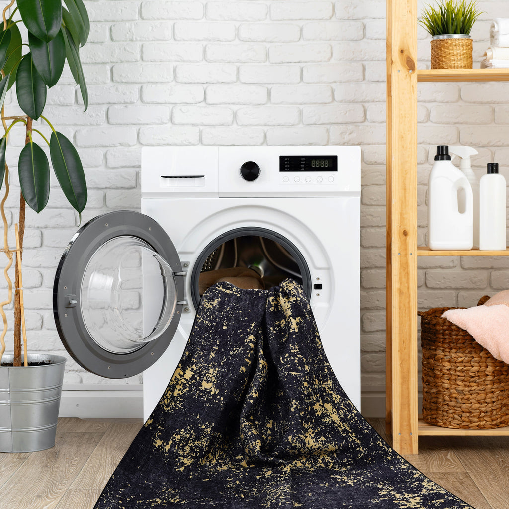 Black and Gold washable rug shown in a room